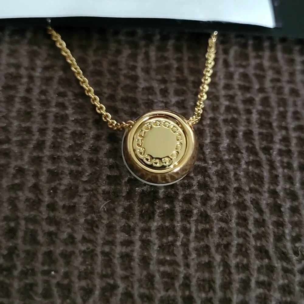 Coach Gold💛 Raised Slider Disc📀 Pendant Necklace